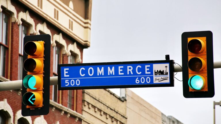 E-commerce banner hanging between two traffic lights